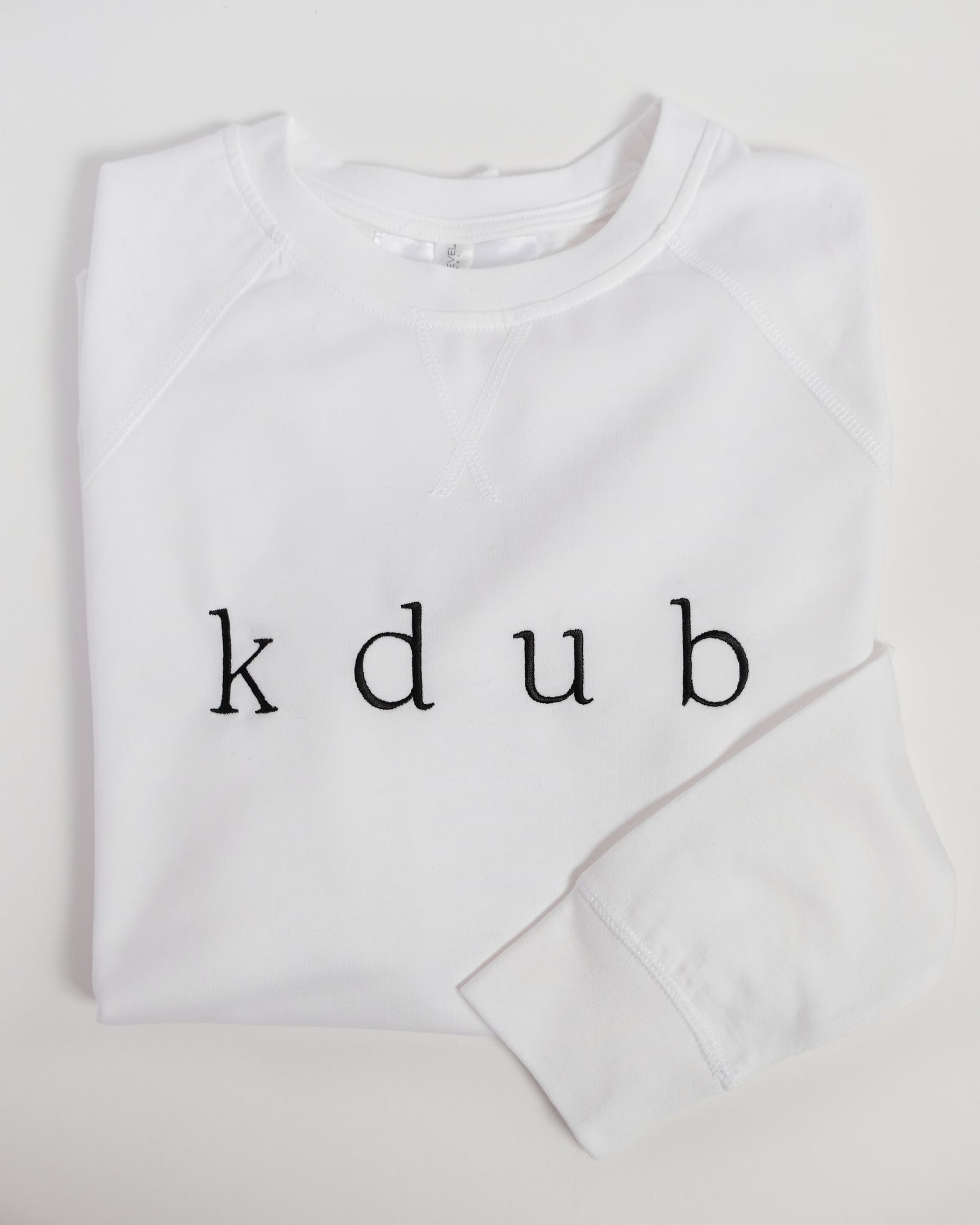 k d u b crewneck